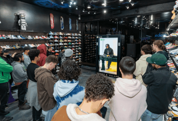 A group of people looking at a screen AI-generated content may be incorrect.
